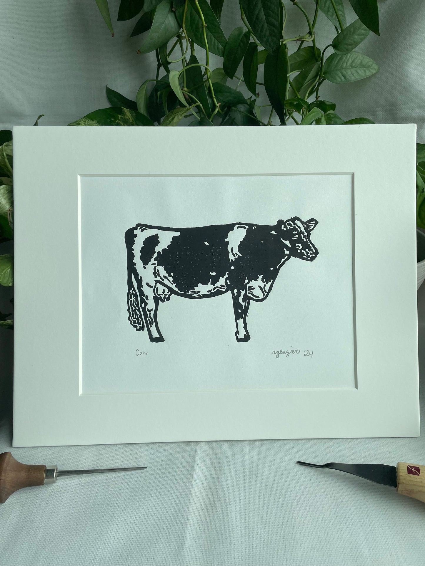 Cow matted to 11x14”